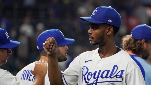 Sep 18, 2021; Kansas City, Missouri, USA; Kansas City Royals center fielder Michael A. Taylor (2) celebrates with team mates after the win over the Seattle Mariners at Kauffman Stadium. Mandatory Credit: Denny Medley-USA TODAY Sports